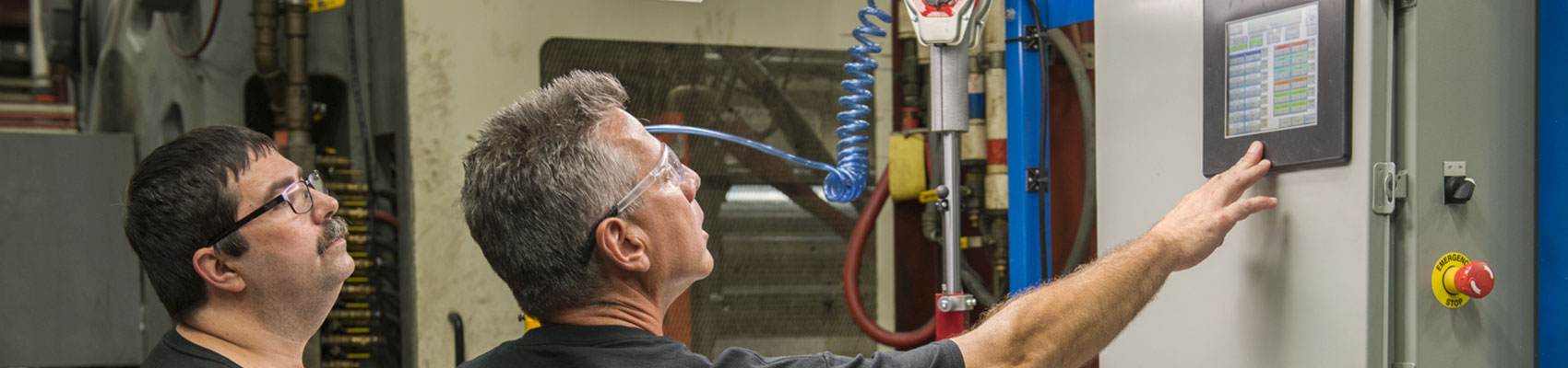 Engineers Checking on Injection Process